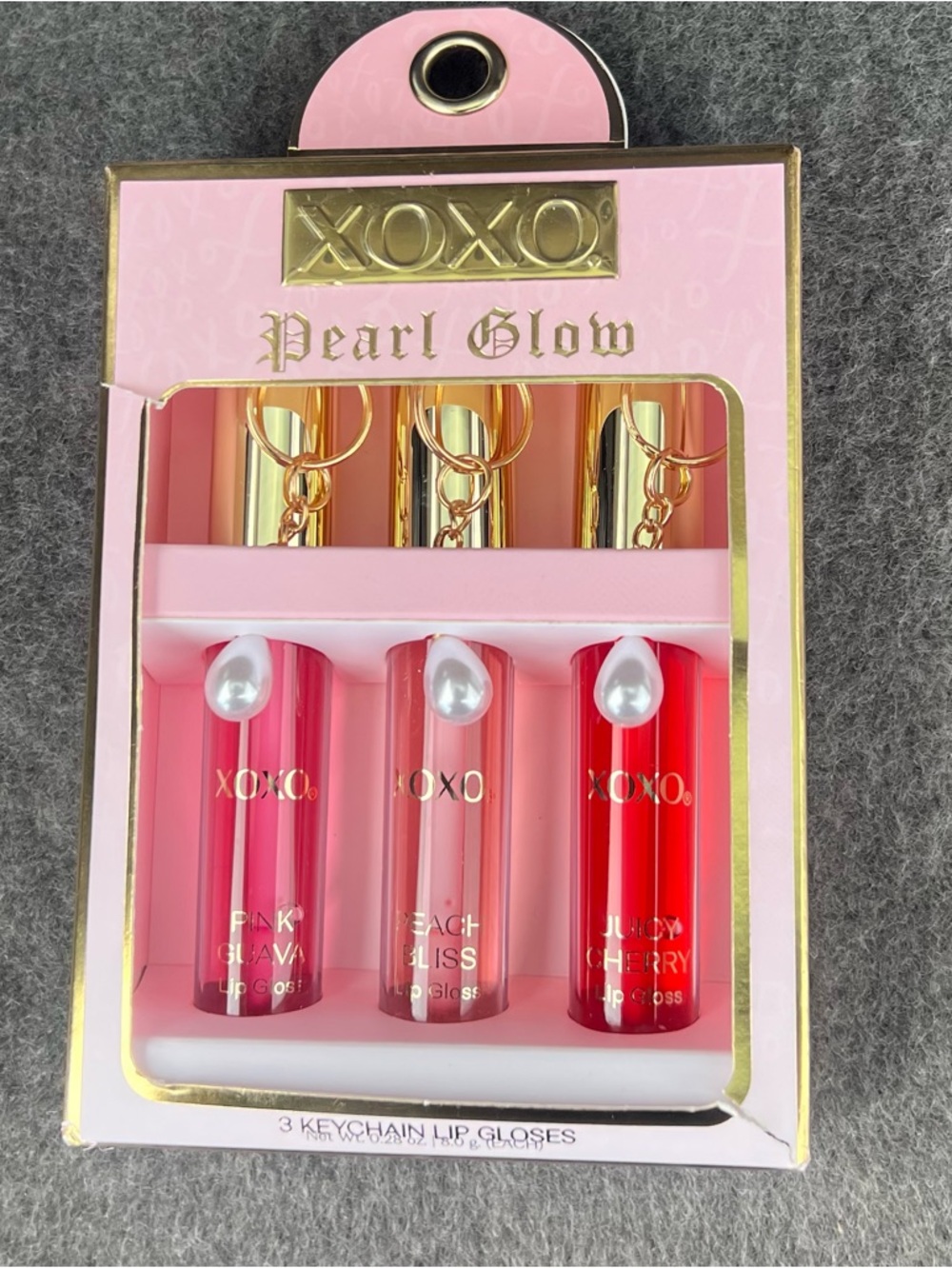 XOXO Pearl Glow Keychain Lip Gloss Trio. Juicy cherry/pink guava/peach bliss.